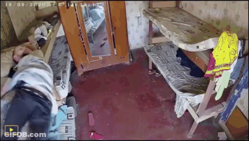 A Person Laying On A Bed In A Room With The Date 18/08/2020 On The Bottom GIF