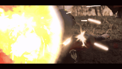 A Person Laying On The Ground With A Skull On Their Pants GIF