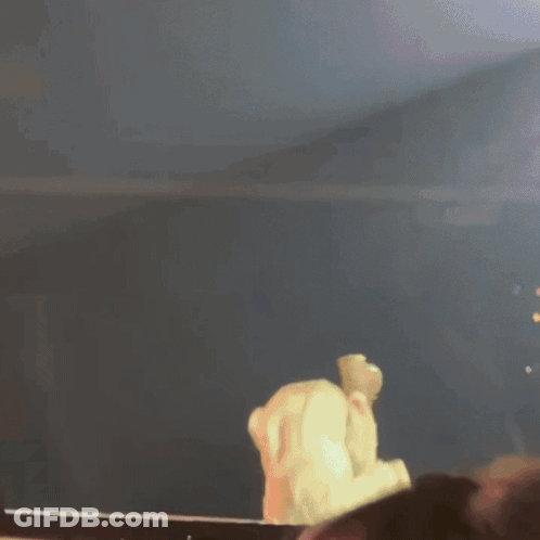 A Person Laying On Their Back With Their Legs Up GIF