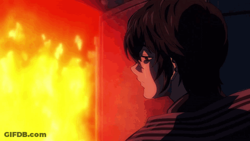A Person Looking At A Fire With A Striped Shirt On GIF