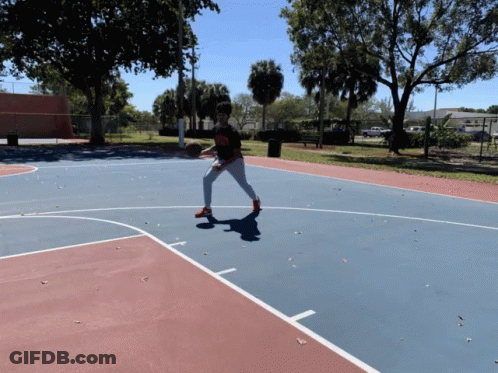 A Person On A Basketball Court Wearing A Black Shirt That Says ' Nba ' On It GIF