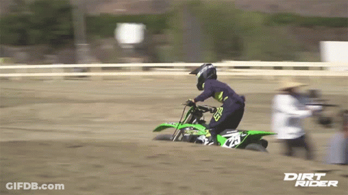 A Person On A Dirt Bike With Dirt Rider On The Bottom GIF