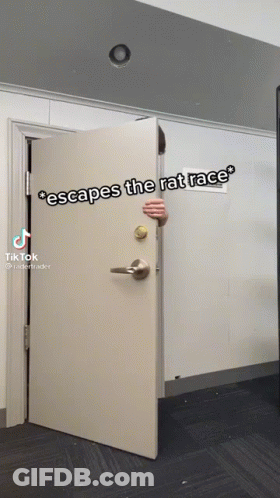 A Person Peeking Out From Behind A Door That Says " Escapes The Rat Race " On It GIF