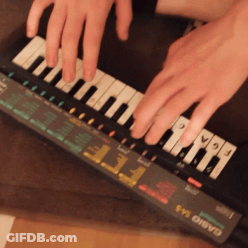 A Person Playing A Casio Keyboard With Their Fingers On The Keys GIF