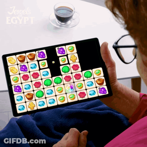 A Person Playing A Game Called Jewels Of Egypt On A Tablet GIF