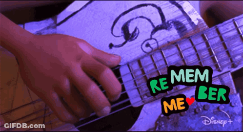 A Person Playing A Guitar With A Sticker That Says Remember Me GIF
