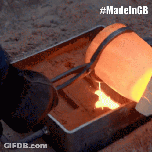 A Person Pouring Molten Metal Into A Metal Container With The Hashtag #Madelngb On The Bottom GIF