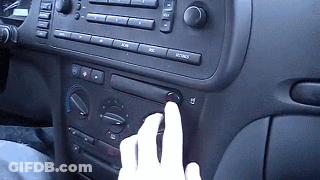 A Person Pressing A Button On A Car Dashboard GIF