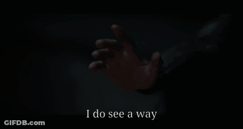 A Person Reaching Out In The Dark With The Words I Do See A Way GIF