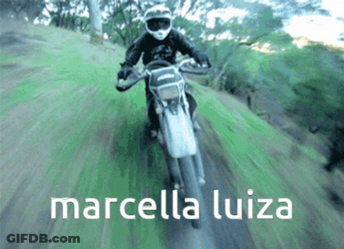 A Person Riding A Dirt Bike With The Name Marcella Luiza Written Below Them GIF