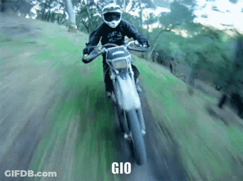 A Person Riding A Dirt Bike With The Word Gio On The Bottom Right GIF