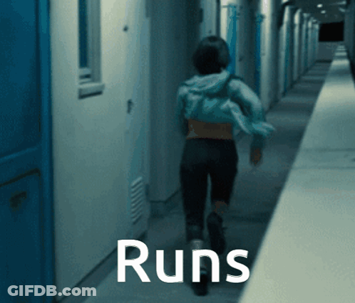A Person Running Down A Hallway With The Word Runs Written On The Bottom GIF