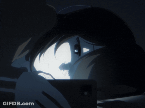 A Person 'S Face Is Shown In The Dark With A Light Coming Out Of It GIF