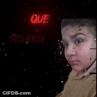 A Person 'S Face Is Visible In Front Of A Neon Sign That Says Nanda Audio . GIF