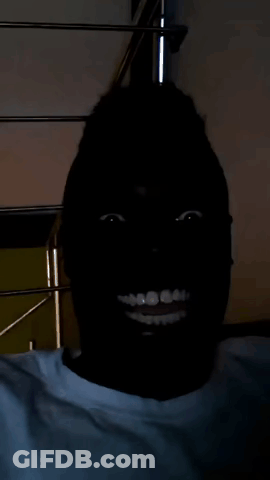 Person Smiling In Dark Face GIF