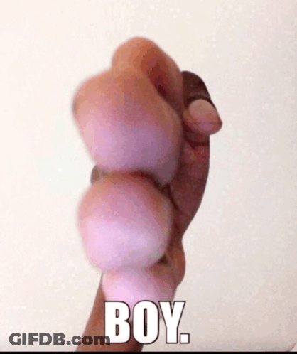 A Person 'S Hand Is Holding A Ball And The Word Boy Is On The Bottom GIF