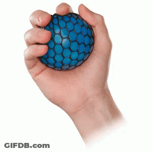 A Person 'S Hand Is Holding A Blue Ball In Their Hand GIF