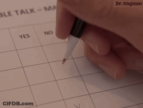 A Person 'S Hand Is Holding A Pen Over A Calendar That Says Yes GIF