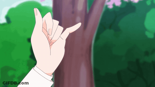 A Person 'S Hand Is Making A Peace Sign GIF
