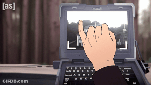 A Person 'S Hand Is Pointing At A Laptop Screen With The Letter L On It GIF