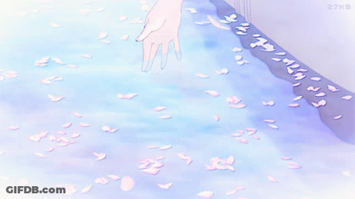 A Person 'S Hand Is Reaching Out To Touch A Stream Of Water GIF