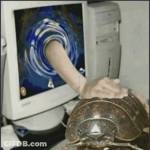 A Person 'S Hand Is Sticking Through A Computer Screen GIF