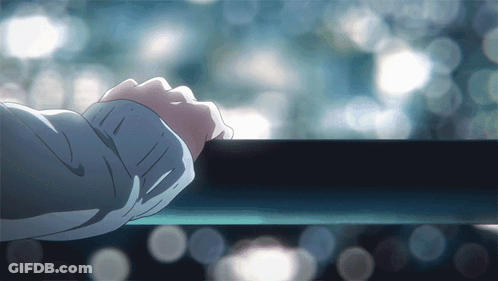 A Person 'S Hand Rests On A Railing In Front Of A Window GIF