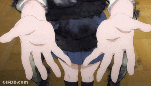 A Person 'S Hands Are Spread Out In Front Of A Black Background GIF