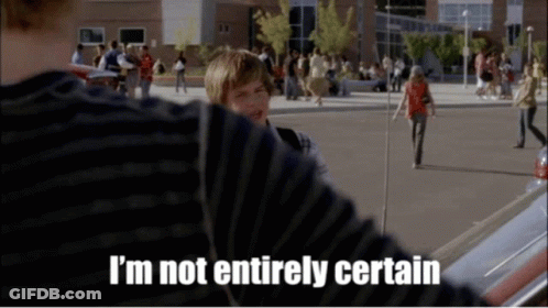 A Person Says I 'M Not Entirely Certain In Front Of A Crowd GIF