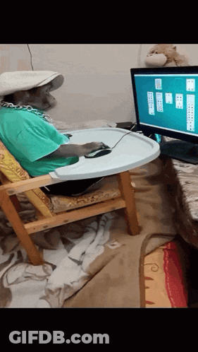 A Person Sitting In A High Chair Playing A Computer Game GIF