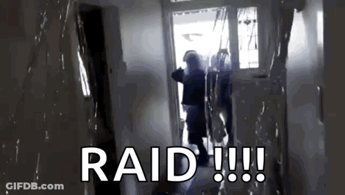 A Person Standing In A Hallway With The Word Raid Written On The Bottom GIF
