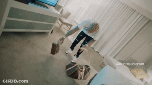 A Person Standing In A Room With A Worldstarhiphop.com Logo On The Bottom GIF