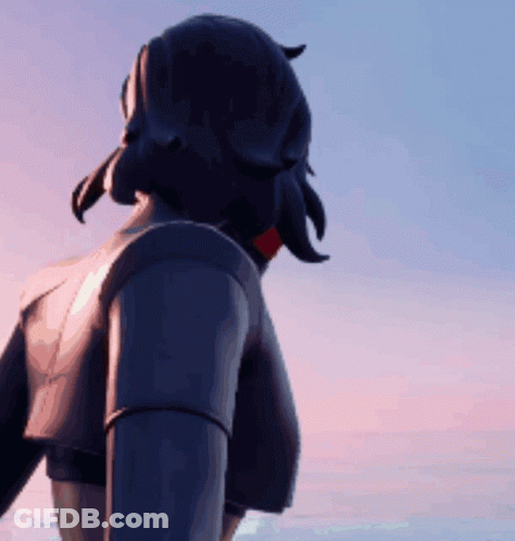 A Person Standing In Front Of A Blue Sky With A Sunset In The Background GIF