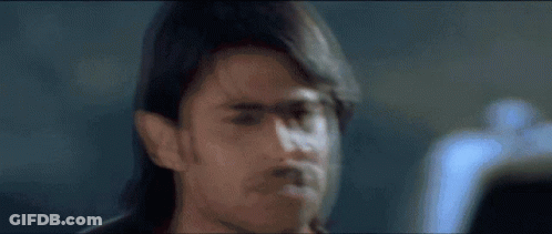 A Person Standing In Front Of A Bright Blue Sky GIF