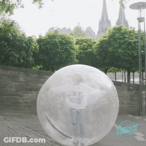 A Person Standing Inside Of A Clear Bubble That Says Carolin Kedkus Show GIF