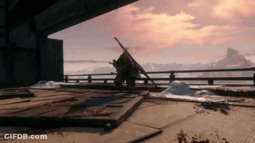 A Person Standing On A Ledge With A Sword In Front Of A Mountain GIF