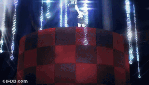 A Person Standing On Top Of A Red And Black Checkered Table In A Dark Room GIF