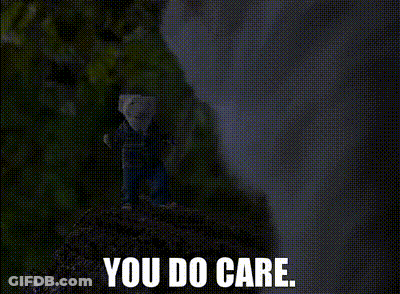 A Person Standing On Top Of A Rock With The Words You Do Care Below Them . GIF