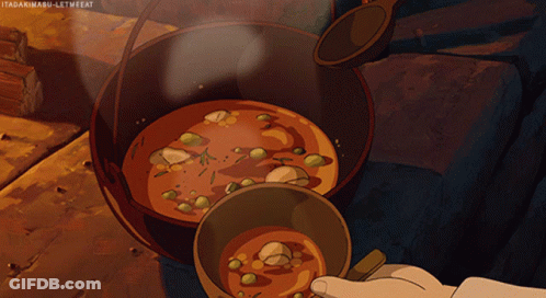 A Person Stirring A Pot Of Soup With A Spoon GIF