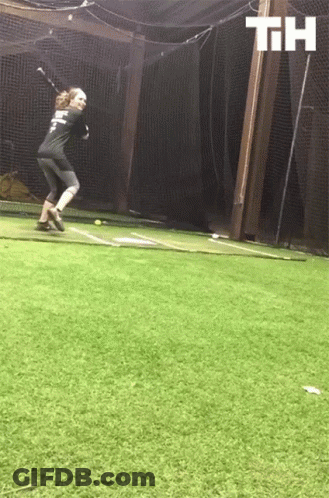 A Person Swinging A Bat With The Letters Th Above GIF