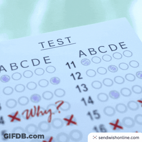 A Person Taking A Test With Why Written On It GIF