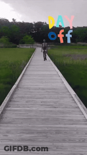 A Person Walking Down A Wooden Boardwalk With Day Off Written On The Bottom GIF