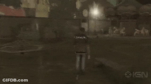 A Person Walking In A Dark Room With Ign On The Bottom GIF