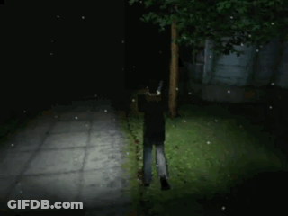 A Person Walking In The Dark With A Flashlight In Their Hand GIF