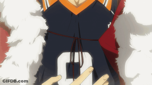 A Person Wearing A Black And Orange Jersey With The Letter J On It GIF