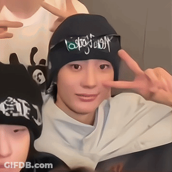 Person In Black Beanie With Jesus And Peace Sign GIF