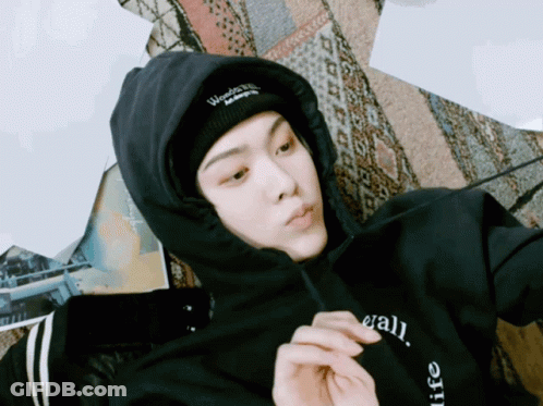 A Person Wearing A Black Hoodie And A Beanie That Says Wonderful Life GIF
