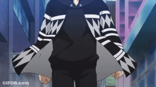 A Person Wearing A Black Hoodie With White Stripes On It GIF