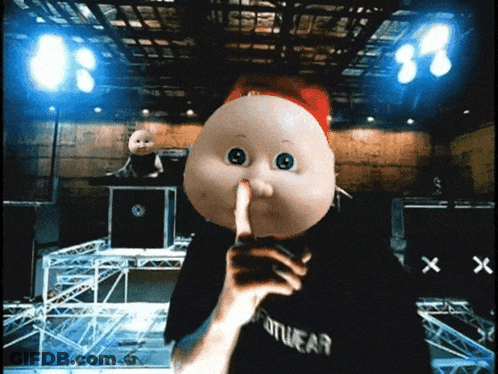 A Person Wearing A Black Shirt That Says Footwear GIF