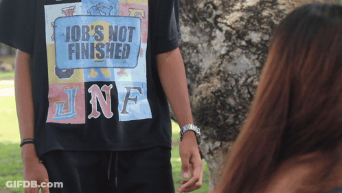 A Person Wearing A Black Shirt That Says Job 'S Not Finished GIF